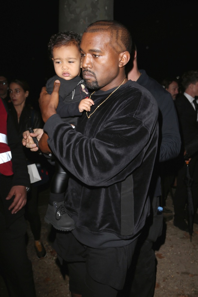 Kim Kardashian, Kanye West and daughter North seen arriving at the Balenciaga Fashion show in Paris